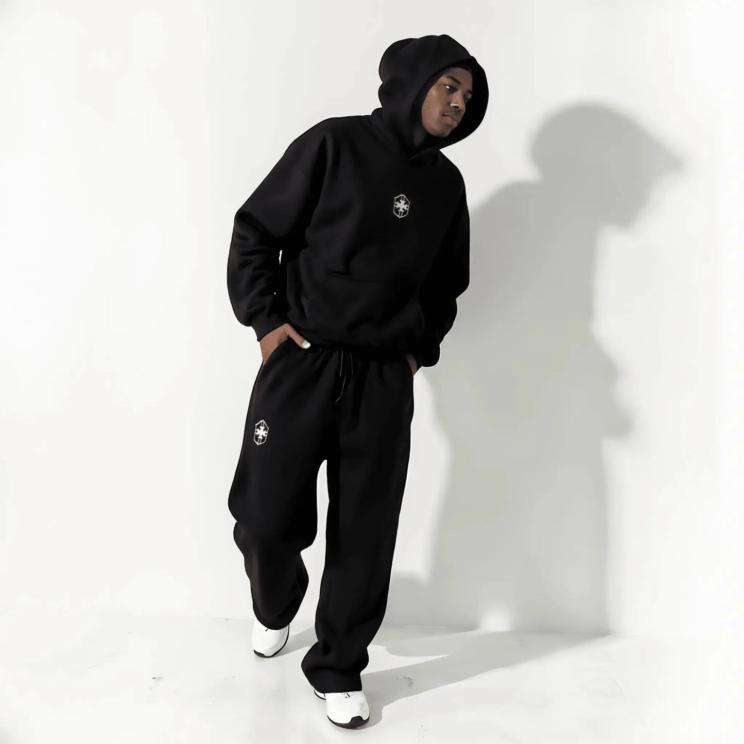 Flat lay of the Setamoda Brazil tracksuit in grey and black – minimalist UK aesthetic