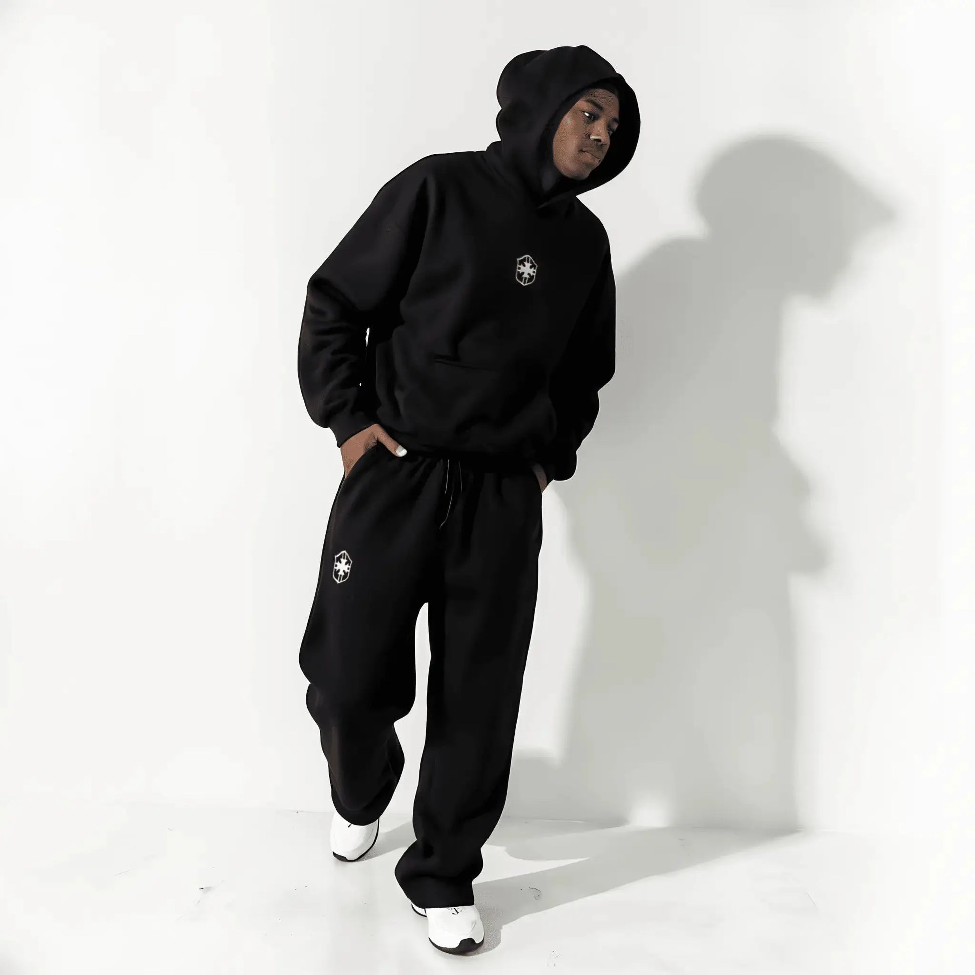 Flat lay of the Setamoda Brazil tracksuit in grey and black – minimalist UK aesthetic

