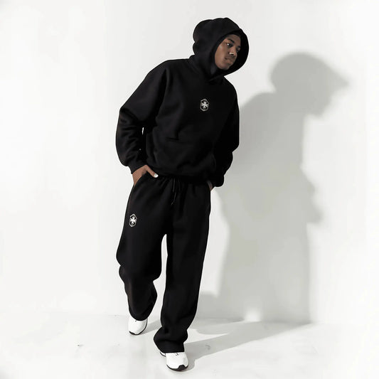 Flat lay of the Setamoda Brazil tracksuit in grey and black – minimalist UK aesthetic

