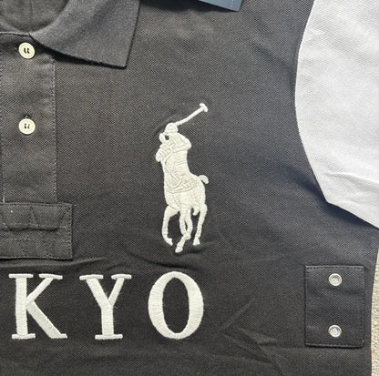 Minimalist side view of Tokyo black polo – contemporary streetwear
